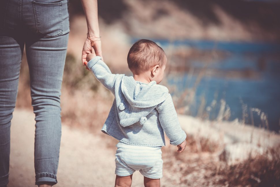 coping with parental stress, mother and child walking